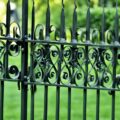 how to keep dog in wrought iron fence