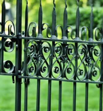 how to keep dog in wrought iron fence