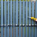 how to add wood to wrought iron fence