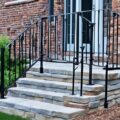 how to install wrought iron railing in brick
