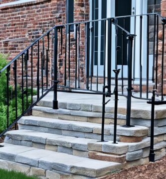 how to install wrought iron railing in brick